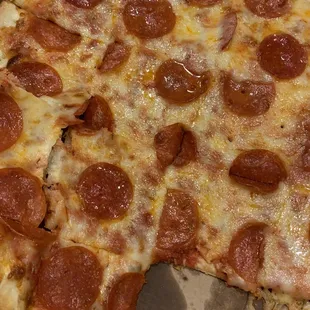 Tiny little cute square slices of pizza - like you get in the frozen food section of the supermarket. What&apos;s up?