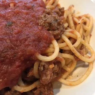 I ordered spaghetti with meat sauce. It was spiced plainly, which allowed me to add whatever I wanted.