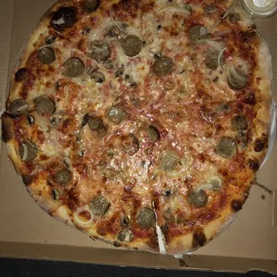 Pizza - skimpy on toppings, sausage onion and mushroom