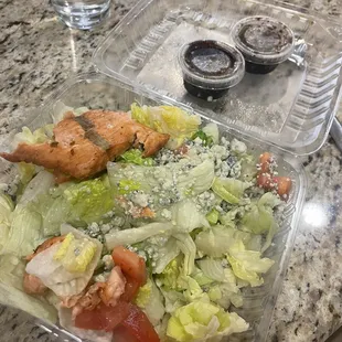 a salad in a plastic container
