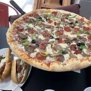 Pizza- black olives, mushrooms,pepperoni,sausage,greenpepper