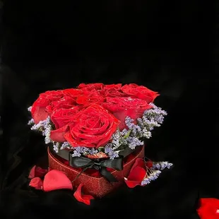 Gorgeous roses, set in a beautiful red, heart-shaped box, pave style. So elegant! Your choice of rose color.