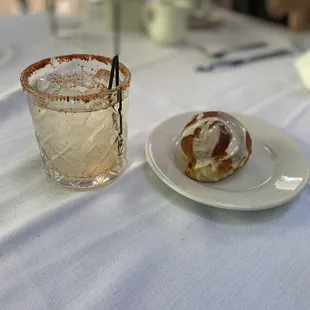 Cocktail and cinnamon roll
