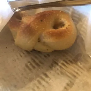 Garlic knot.  Doesn&apos;t taste house-made, more like Pillsbury.