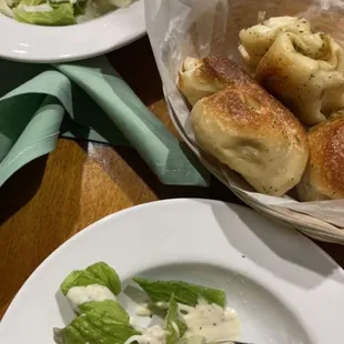 caesar and ranch dressing salad with garlic knots