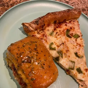 two slices of pizza on a plate