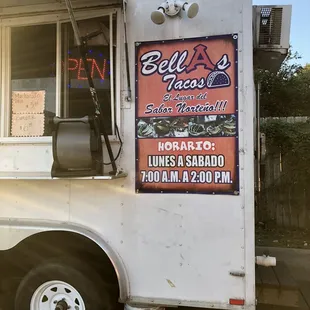 a food truck parked on the side of the road