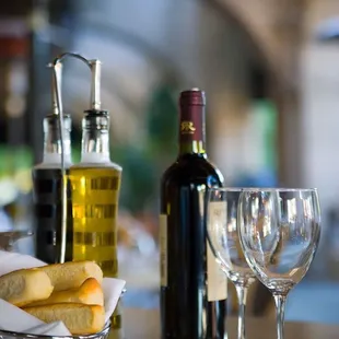 a glass of wine and bread