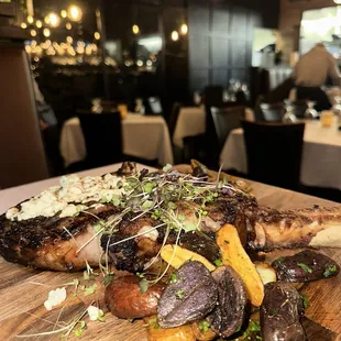Tomahawk steak with roasted fingerling potatoes