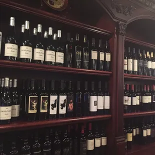 a wall of wine bottles