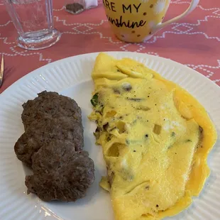Main course for breakfast: sausage and a custom-made omelet!