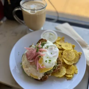 Avocado toast w/ egg and pickled onion with a side of plantain chips.