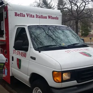 a food truck parked on the side of the road