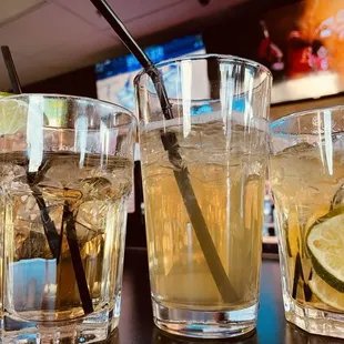 three glasses of lemonade