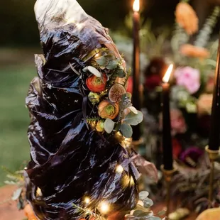 a table setting with candles and flowers