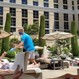 Staff handing out free little cups of dole whip!