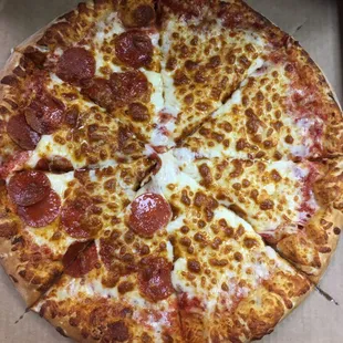 Super Cheesy Pizza! Half Cheese Half Pepperoni!