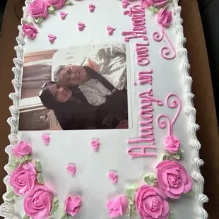 Full-size white sheet cake with fresh strawberry filling