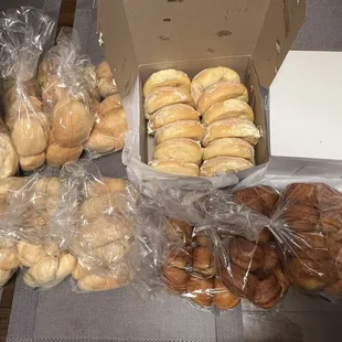Left to right: Pandesal 10pcs/bag  (top left), ensemada dozen/box, spanish rolls dozen/bag (bottom left) and kababayan dozen/bag