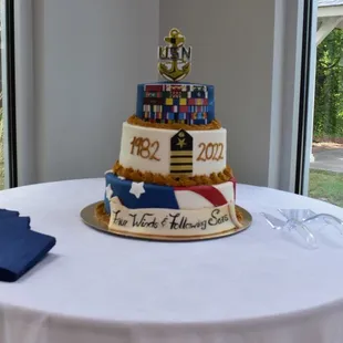 a three tiered cake decorated with the colors of the united states