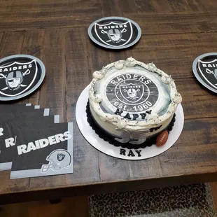 a birthday cake for a raiders fan