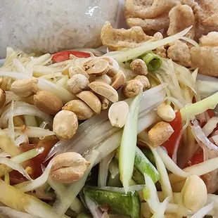 Papaya salad mid level spice has zing..very tasty!