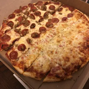 a pepperoni pizza in a box