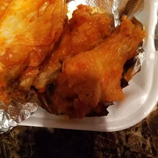 It's takeout from Bella's tonight. Greek salad, wings and margherita pizza.