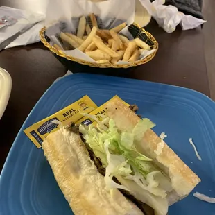 Half of the cheese steak, did not care for the meat used. Fries were very good