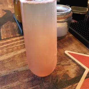 a drink in a tall glass