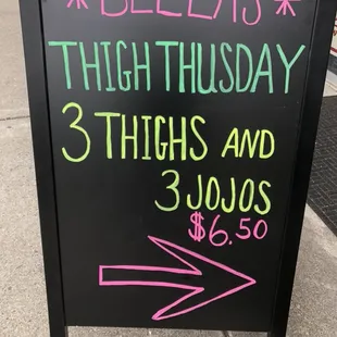 a blackboard with neon writing