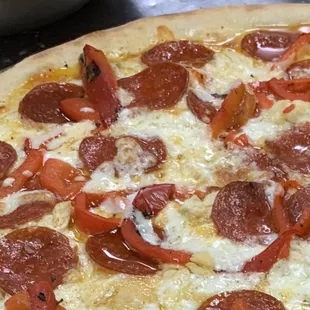 Awesome Pizza!! White pie with roasted peppers and pepperoni