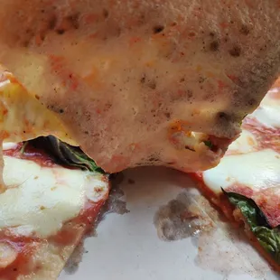Bread underneath the margherita pizza