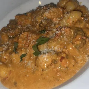 Potato Gnocchi with pink sauce and meat sauce