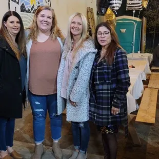 a group of women standing together