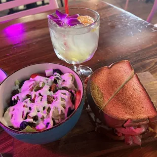 Grilled chicken sandwich , house salad and a fresh margaritas.