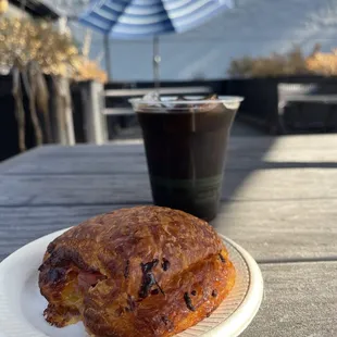 Cold brew with a ham and cheese croissant