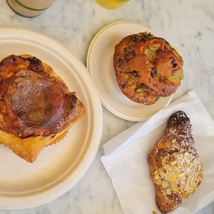 Iced tea, iced Chai, breakfast sandwich, onion tart, twice baked almond croissant... and disposable serveware, even though we dined in.