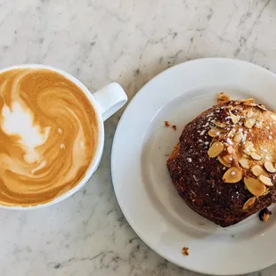 Hot toffee latte with a raspberry lemon almond croissant