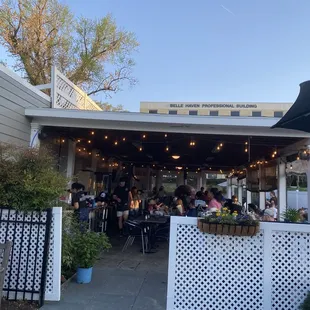 Outside patio, and there are few more tables outside of this covered patio area.