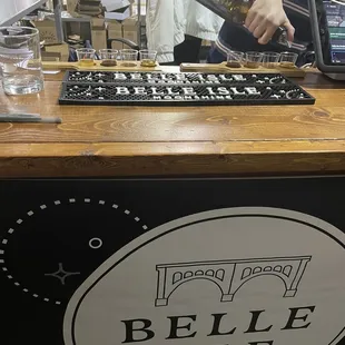 a bartender pouring a drink