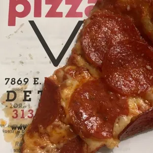 Greasy pepperoni pizza