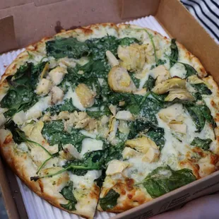 Spinach artichoke ($12.95 small) - spinach artichoke sauce, house cheese blend, marinated artichokes, spinach, garlic olive oil, parmesan