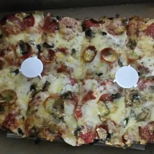 Pepperoni mushroom Detroit style pizza.