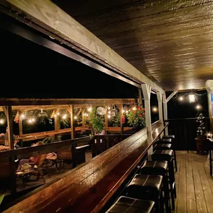 a bar with a view of the ocean