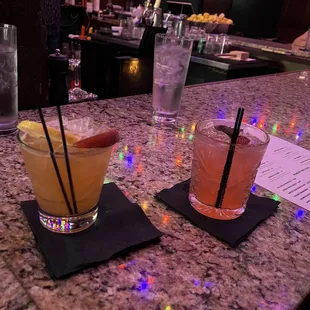 two cocktails on the bar