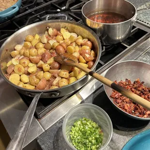 Preparing the hot German potato salad