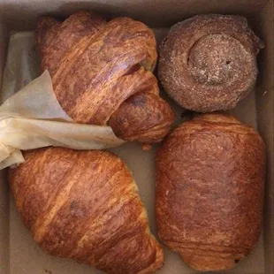 a variety of pastries in a box