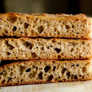 a stack of three slices of bread