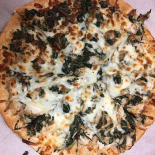 newest award winning chicken and greens pizza